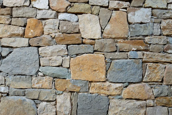 Parede velha em pedras — Fotografia de Stock