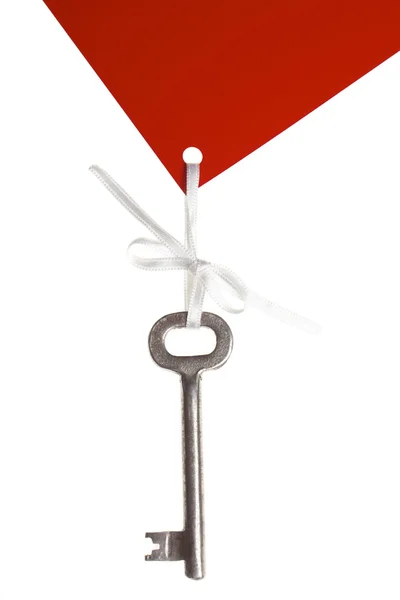 Old key with red label — Stock Photo, Image