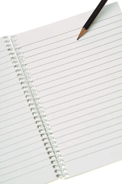 Lápis preto em páginas brancas abertas — Fotografia de Stock