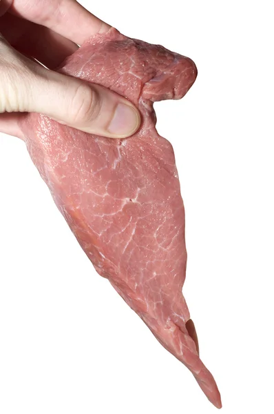Piece of fresh beef in a hand — Stock Photo, Image