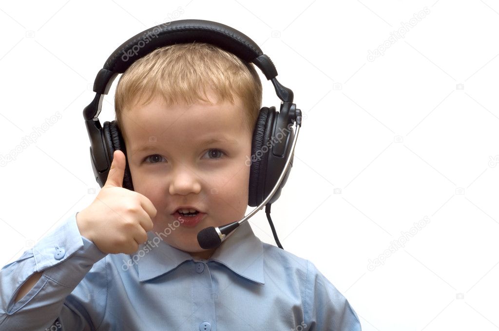 Boy in ear-phones shows gesture