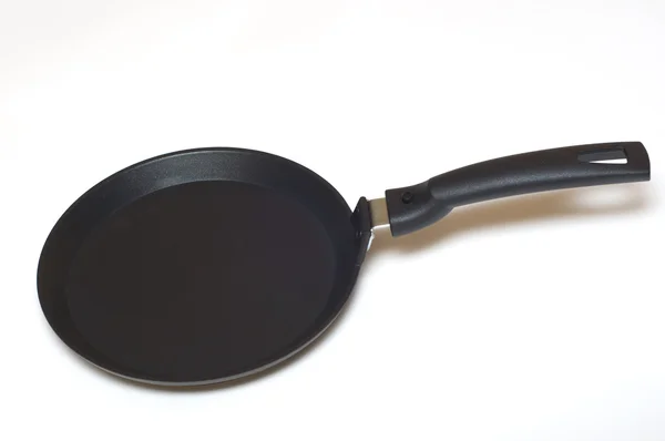 Черная сковородка для блинчиков Стоковое Изображение