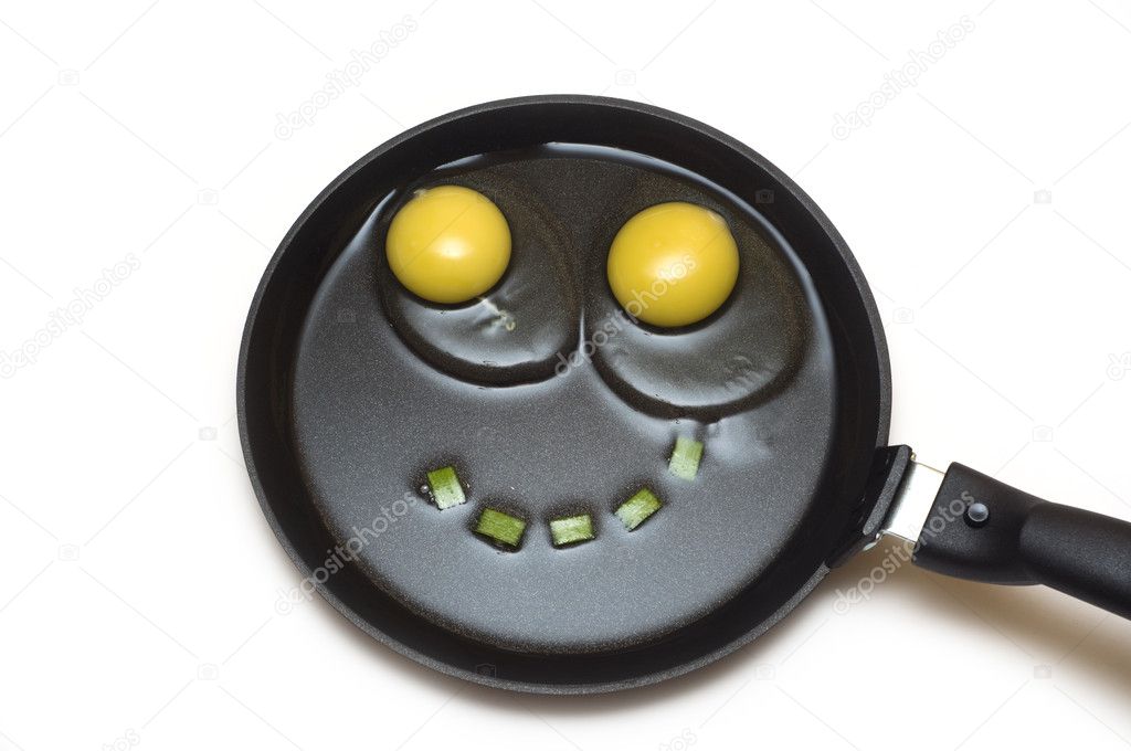 Two eggs on a frying pan with a smile