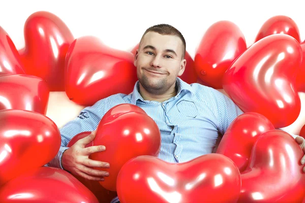 Man with red hearts — Stock Photo, Image