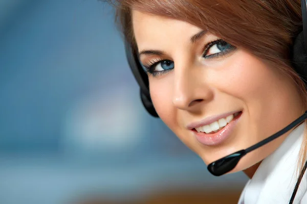 Reprezentatív mosolygó call center nő Stock Kép