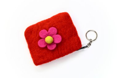 Red woolen purse on a white clipart