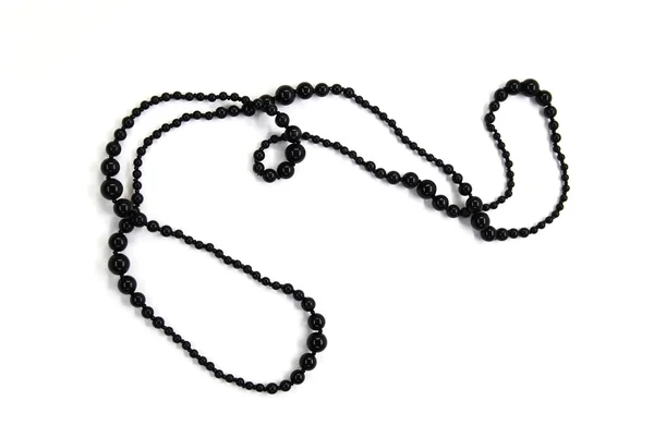 Lange schwarz glänzende Halskette — Stockfoto