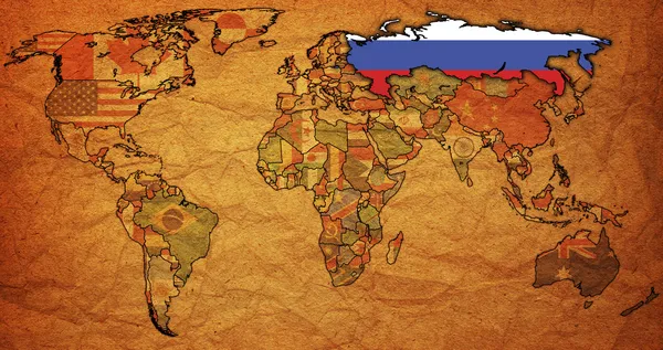 Russia on old paper map of world — Stock Photo, Image