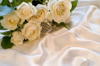 White wedding rose on silk background clipart