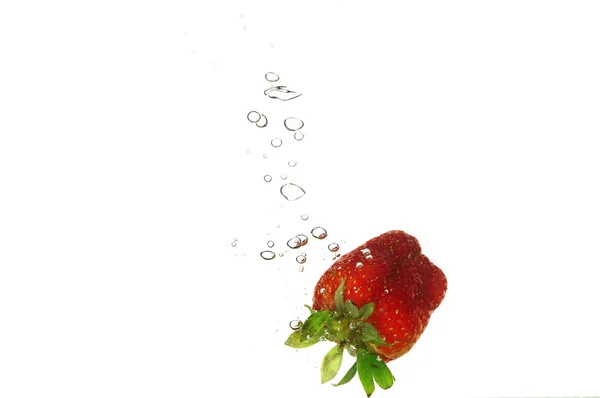 Strawberry splashing — Stock Photo, Image