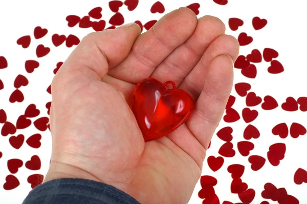 Red hearts in hand — Stock Photo, Image