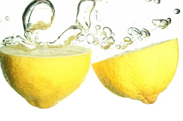 Lemons splashing — Stock Photo, Image