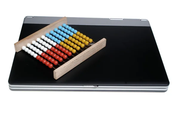 Laptop és abacus — Stock Fotó