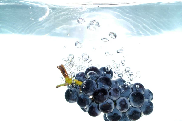 Splash grape — Stock Photo, Image