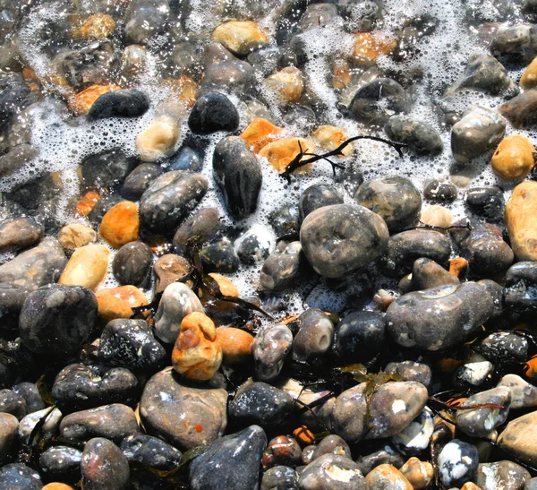 stock image Sea Foam and Pebbles