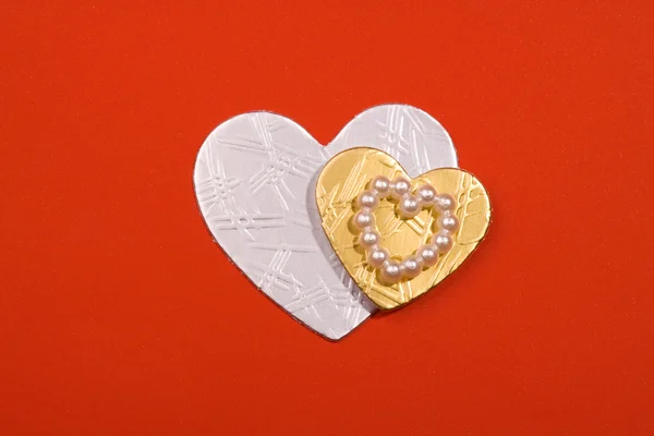 Silver and gold hearts — Stock Photo, Image