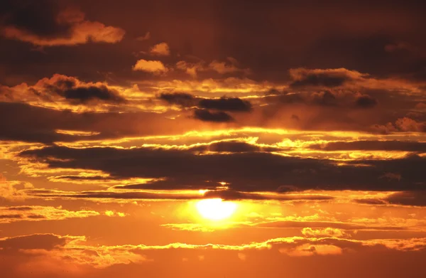 Захід сонця та хмари Стокова Картинка