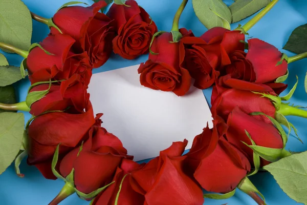 Note in the rose's heart — Stock Photo, Image