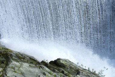 Waterfall in the wild nature clipart