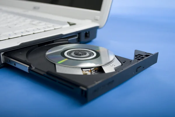 Компьютер и CD-ROM — стоковое фото
