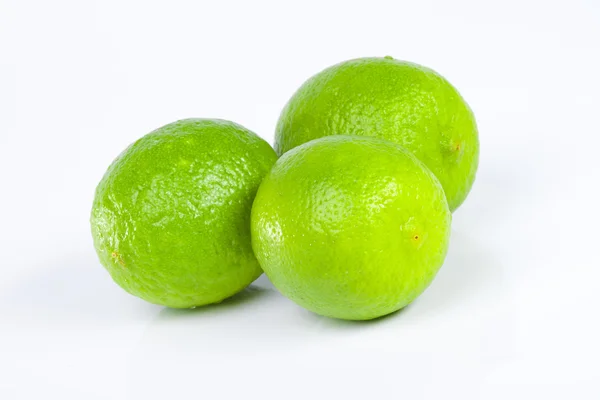 Three green limes — Stock Photo, Image