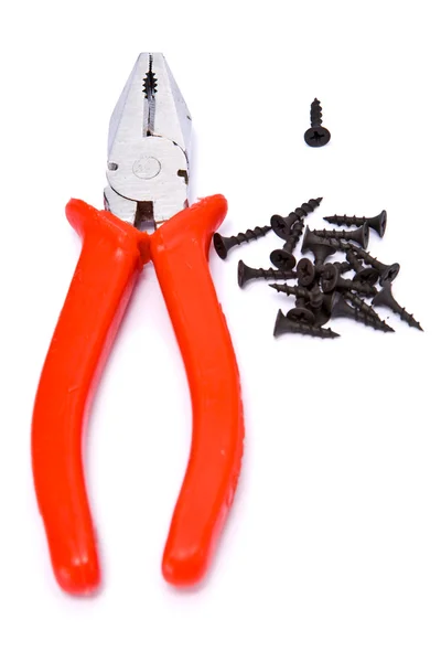 Pliers and screw — Stock Photo, Image