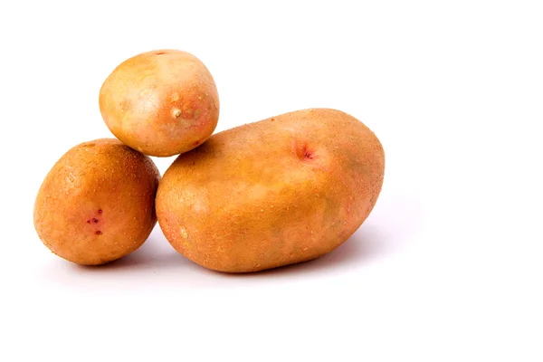 Potatoes and kitchen device — Stock Photo, Image