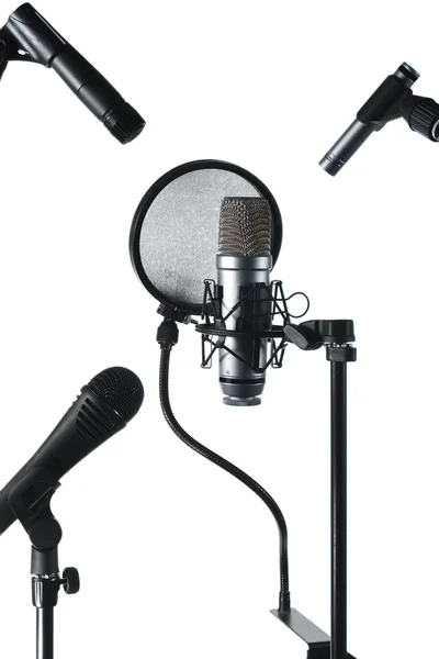 Drie microfoons — Stockfoto