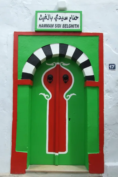Červené zelené dveře — Stock fotografie