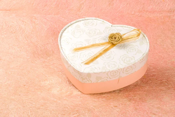 Gift box in heart pattern — Stock Photo, Image