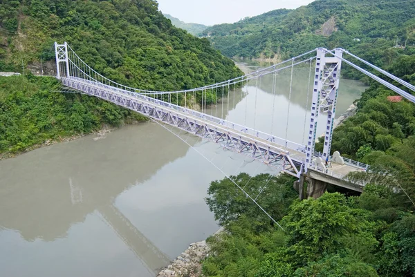 stock image Suspension bridge btween mountains