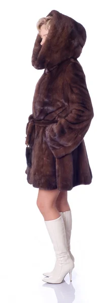 stock image Beautiful woman in fur coat three