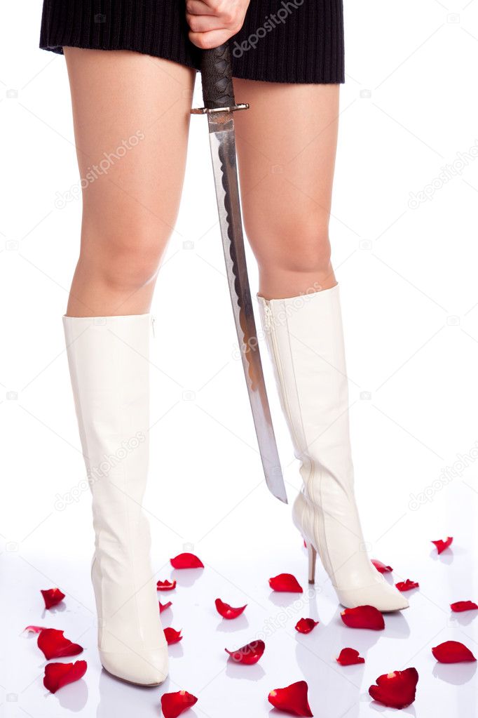Beautiful woman legs with sword