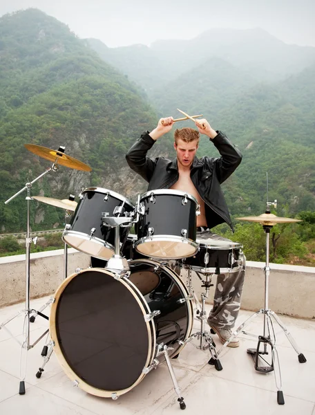 stock image Drummer playing drums