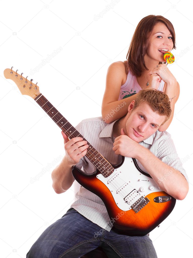 Men with guitar and girl with candy