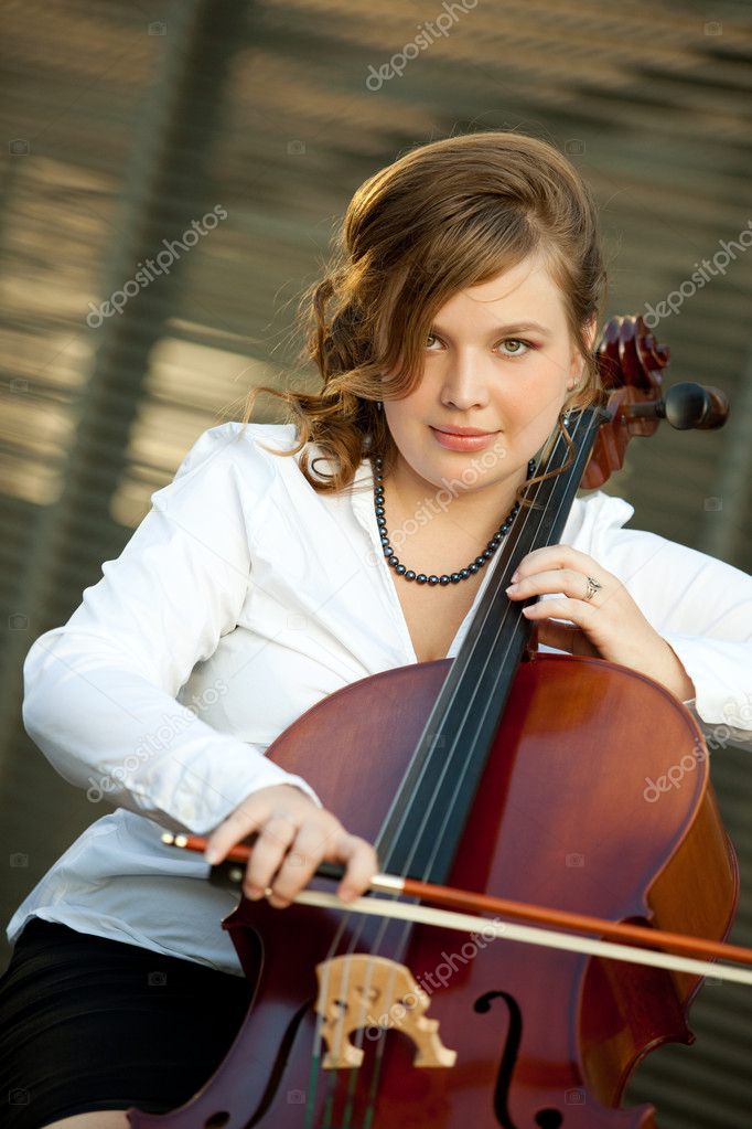Beautiful woman with cello