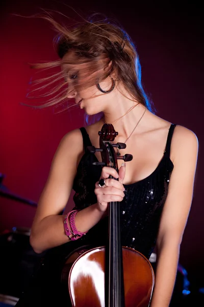 Mulher bonita com instrumento musical — Fotografia de Stock