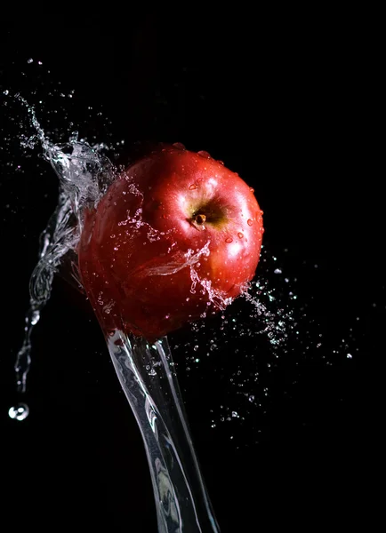 Apple and waters splashes four — Stock Photo, Image