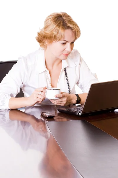 Businesswoman with cup and laptop three — Stock Photo, Image