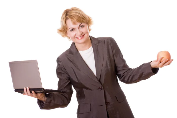 Donna d'affari con laptop e mela uno — Foto Stock