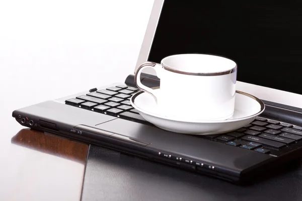 stock image Laptop and a cup of tea one