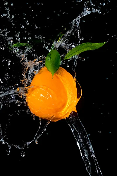 Plamy pomarańczy i wody — Zdjęcie stockowe