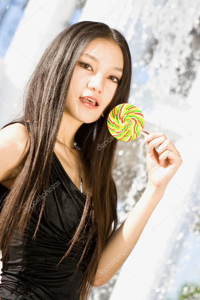 Chinese girl with candy two