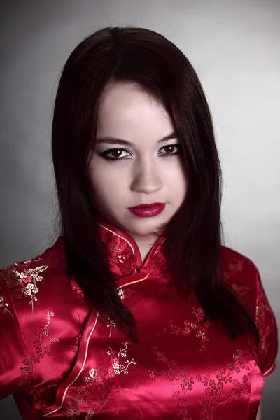 Mulher em vestido chinês — Fotografia de Stock