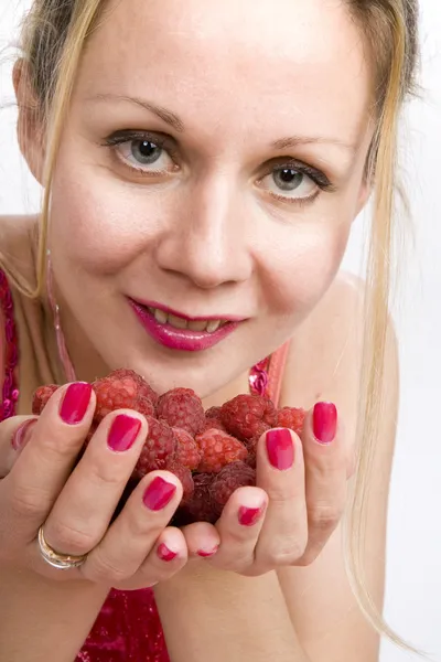 Blonde with raspberries — Stock Photo, Image