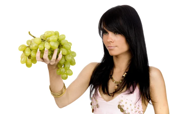Brunette with bunch of grapes — Stock Photo, Image