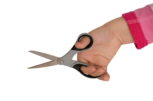Child hand holding open scissors — Stock Photo, Image