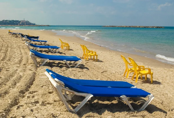 stock image Sunbeds and chairs on the beach