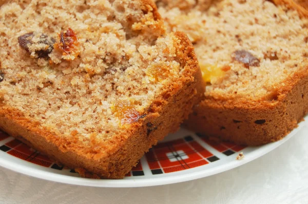 stock image Brown cake with dried fruits