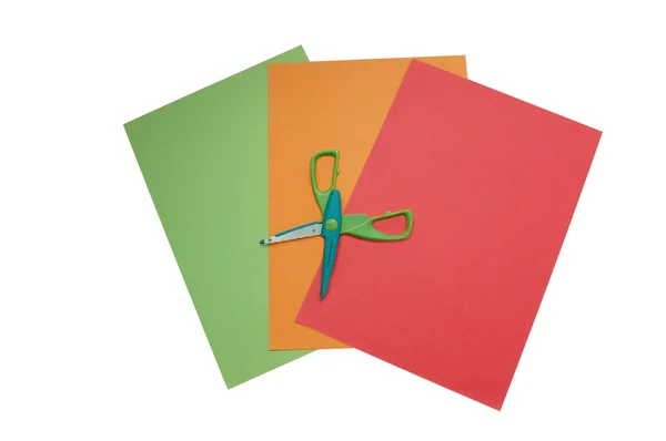 Colourful papers with open scissors — Stock Photo, Image